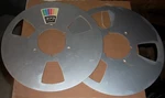 Ampex Metal Empty Reel 1/4" 10.5" Halves. Fixed Price $30.00.