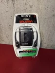 Sony Walkman Cassette Tape Portable Player WM-EX10 W/ Headphones New Nos. Fixed Price $159.99.