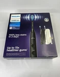 Philips Sonicare Professional Clean Electric Toothbrush 2-HANDLE Set Open Box. Fixed Price $46.97.