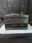 Montgomery Ward Turn Table Record Vinyl And Dual Cassette Tape Deck JSA63157. Fixed Price $65.00.