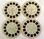Set Of 4 Vintage View-master 3D Reels Lassie, Little Pigs, People, Animals. Fixed Price $6.95.